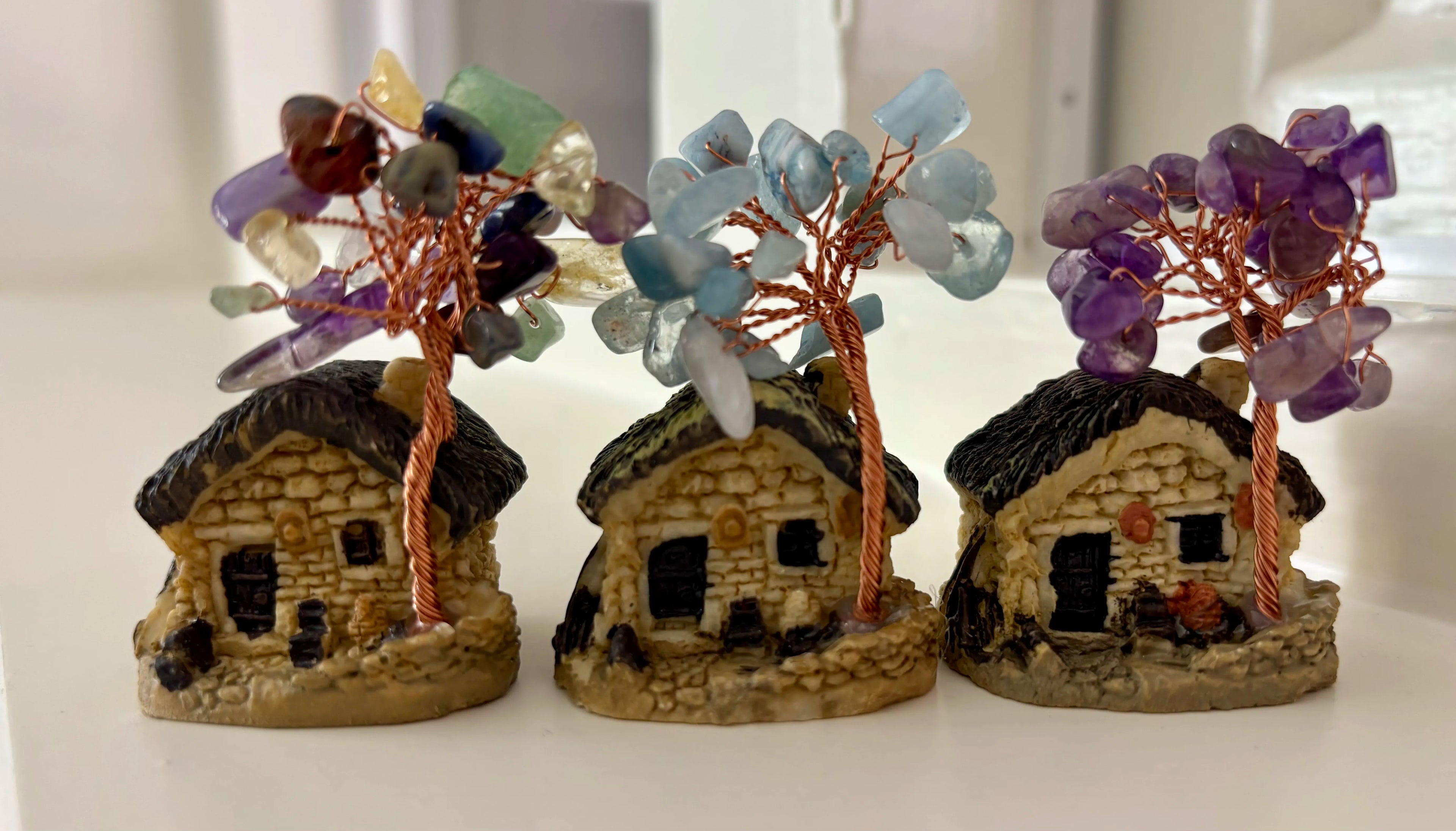 Huisje met aquamarijn boom