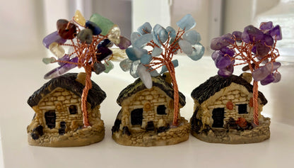 Huisje met chakra boom